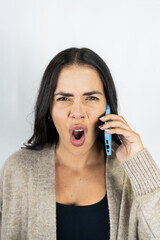 Woman yelling on phone, feeling angry stress frustrated