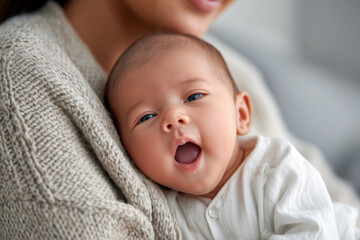Yawning Newborn Baby Blue Eyes Mom Gray Sweater Hold