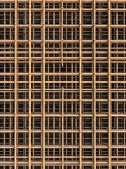 Aerial view of a large grid-structured building complex with numerous windows and a site layout