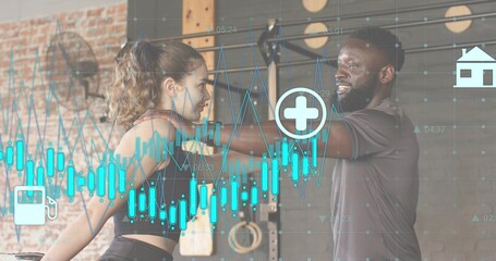 Guiding trainer supporting client in sportswear extending arms at gym, rig and data overlay