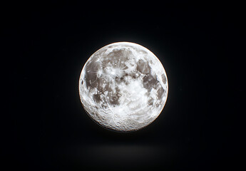 Fototapeta premium Full moon in night sky, glowing brightly against black background, creating serene and captivating atmosphere