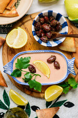 Taramasalata, a traditional Greek meze appetizer made with fish roe and pita bread.