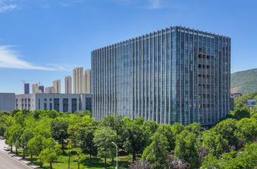 Fototapeta premium Modern Research Institute Building with Urban Landscape