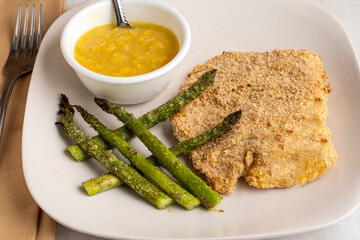  baked haddock with asparagus and cream corn