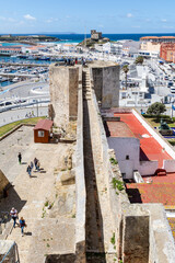 Tarifa, Spain - April 18, 2025: Medieval castle of Guzman el Bueno, during the Easter festivities in Tarifa, Spain