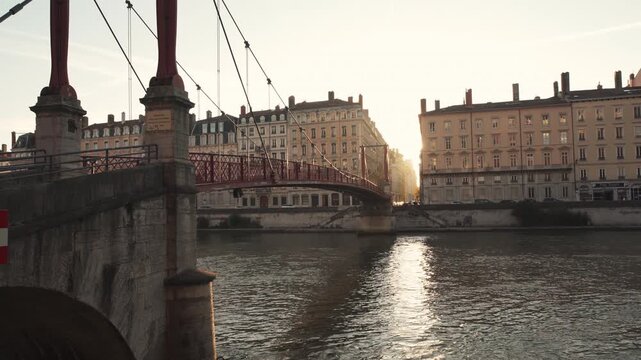 The famous red footbridge leading to the other side of the river Saone. Lyon france - 8 oct 2025