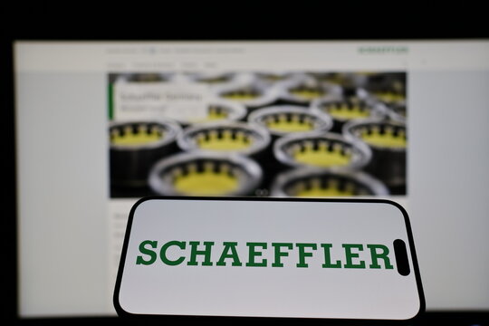 Kiel, Germany - 01-12-2026: Smartphone displaying Schaeffler Group logo in front of the company website on a monitor