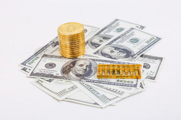 Gold Coins and Abacus on Dollar Bills - Financial Wealth Concept