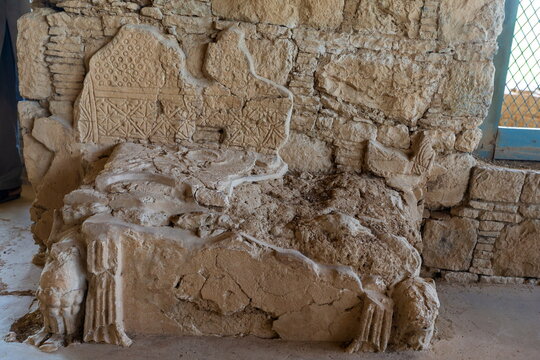View of intricate stone carvings and weathered textures create a mesmerizing tableau of ancient artistry in Taxila, Khyber Pakhtunkhwa, Pakistan.