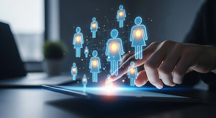 Businessman interacting with glowing human network on digital tablet