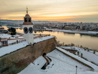 Aerial View of the Iconic Petrovaradin Clock Tower at Sunset in Winter, Novi Sad, Serbia