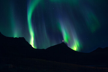 Aurora Polaris on sky above Lofoten islands