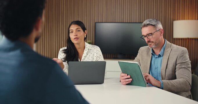 Interview, questions or people in office with tech, discussion or meeting in onboarding. Laptop, tablet or hiring managers with communication, candidate or recruitment for career opportunity.