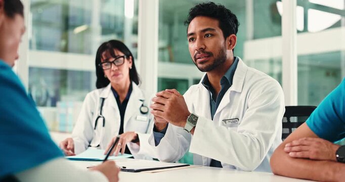 Healthcare, doctors or discussion in office, medical case review or writing notes for insurance filing. People, hospital committee or physician in team meeting for health cover info, talk or process