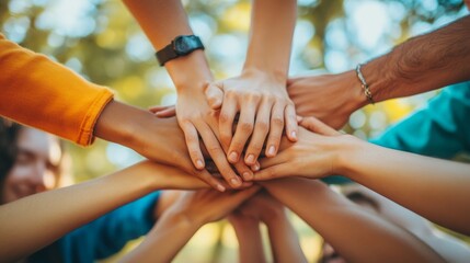 The joined hands of different people symbolise unity and support — a universal backdrop for social campaigns, volunteer initiatives or corporate training sessions.
