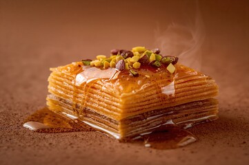 Golden baklava moment caught as honeyed layers shine warmly beneath soft afternoon light