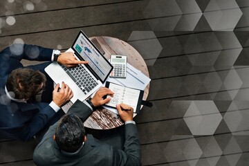 Business partners brainstorming at a cafe