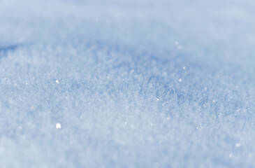 Obraz premium Close-up of snow, untouched snow, sparkling white blanket of snowflakes, ice crystals, pure ground, untouched landscape, white background