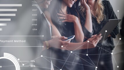 Happy businesswomen using digital devices