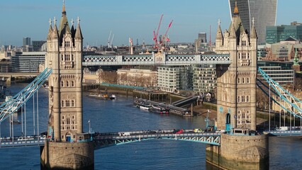 Tower Bridge, a historic landmark, crossing the River Thames with the London skyline
