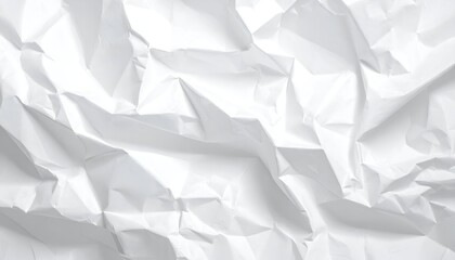 A crumpled white paper with deep folds, creating a textured and abstract surface