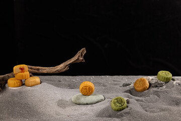 Traditional Mooncakes Mid-Autumn Festival Celebration on Sand © DangThi