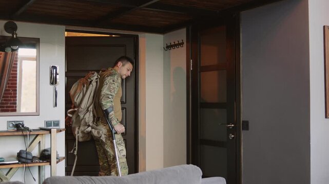 A limping soldier comes home after the war ends.