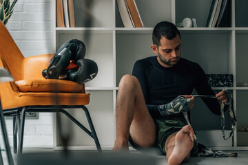 boxer putting on a boxing hand wrap
