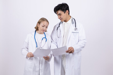 Fototapeta premium Medical team reviewing patient charts