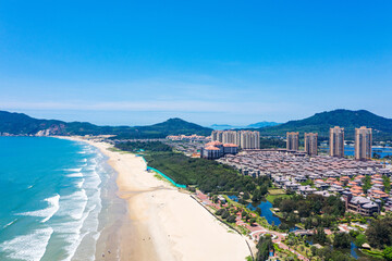 Aerial Beachfront Complex with Residential Towers and Sandy Beach © TaVan