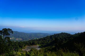 Fototapeta premium Breathtaking Mountain Landscape with Clear Blue Sky and Greenery