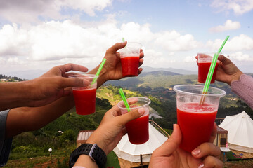 Cheers to Nature with Stunning Views and Refreshing Drinks in Cups