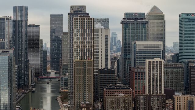 LONDON, UK - JANUARY 07, 2026 - Canary Wharf skyline showing modern skyscrapers and the cityscape with a river running through