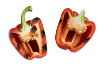 Two halves of a roasted red bell pepper on transparent background charred vegetable food cooking grilled healthy eating organic meal prep