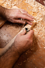 The master works with a small plane