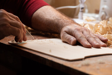 The master cycles the surface of wood with glass