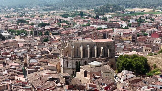 Aerial view of the historic medieval town of montblanc in catalonia, spain. The prominent gothic church of santa maria la major dominates the skyline