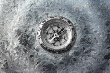 Classic navigation compass on natural background