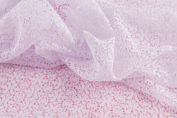 white lace transparent fabric, folded several times. soft folds of the cobwebs of the material. A copy of the space. layout for design