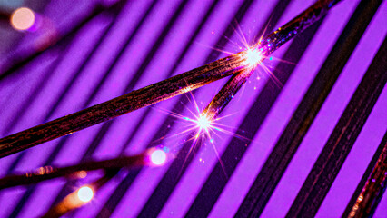 Bright glowing purple lines and sticks arranged diagonally, forming a magical, energetic, and shiny abstract background with dynamic light flow.