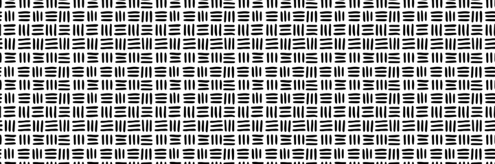 Small dash seamless pattern. Minimalistic black and white texture with a clean geometric style. Ideal for stationery, fabric prints, digital designs, home decor, and more. Vector illustration © Viktoriia