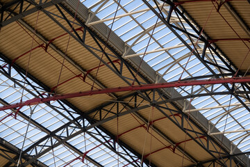 Curved glass and sheet metal roof for use as a background texture