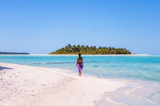 Woman on a beach, Aitutaki, Cook Islands