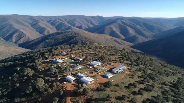 Medium shot of remote copper mining site showcasing ecofriendly extraction with minimal environmental disruption and natural landscape integration.