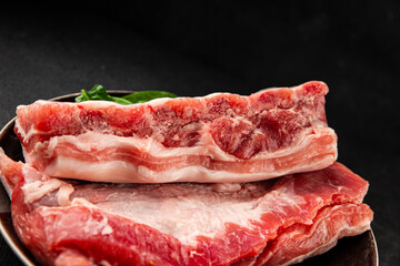 Obraz premium Ribs raw meat pork food preparation tasty snack fresh delicious gourmet food background on the table rustic food top view copy space