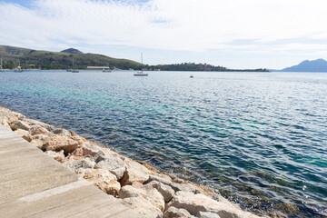 Obraz premium Coastal view with clear water and rocky shoreline.. Palma de Mallorca, Spain