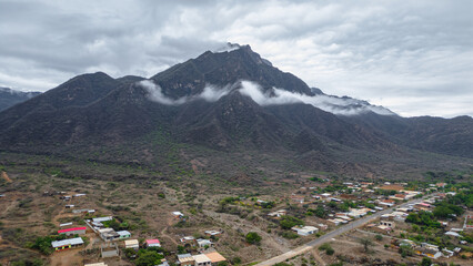 Panoramic aerial drone view of the mountains of Mayasc&oacute;n covered by clouds, Lambayeque, Peru
