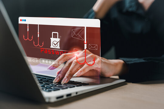 Phishing attack warning with red hooks and password symbols on laptop screen. Concept of online scam, data breach, identity theft, internet fraud, and cybersecurity awareness for digital safety. - Powered by Adobe