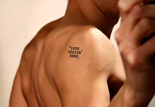 Tattoo on Man Back Shoulder Mockup