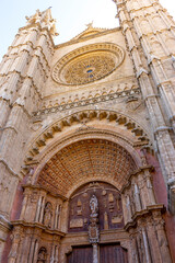 Fototapeta premium Intricate facade of a historic cathedral entrance.. Cathedral of Palma de Mallorca, Spain